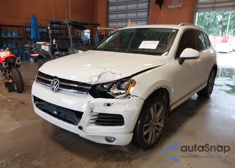2014 Volkswagen Touareg 3.6L Sport from USA, damaged, VIN WVGEF9BPXED005205